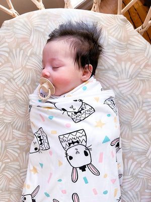 Koala Hugs newborn swaddle blanket to help calm the startle reflex for sleeping baby