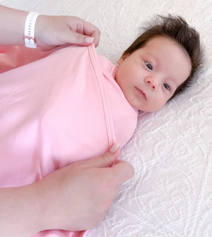 Koala Hugs newborn swaddle wrap helps calm startle reflex for sleeping baby