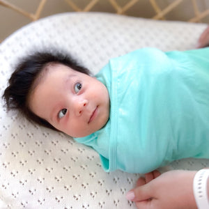 Koala Hugs newborn swaddle wrap helps calm startle reflex for sleeping baby