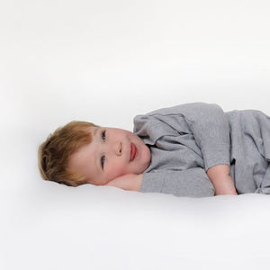Baby sleep sack with sleeves and foldover cuffs for hands