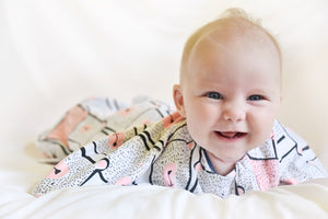 All seasons organic cotton baby swaddle sack for gentle transitioning to free arms for babies starting to roll.