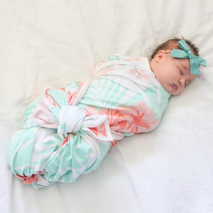 Koala Hugs newborn swaddle wraps to help calm the startle reflex for sleeping baby