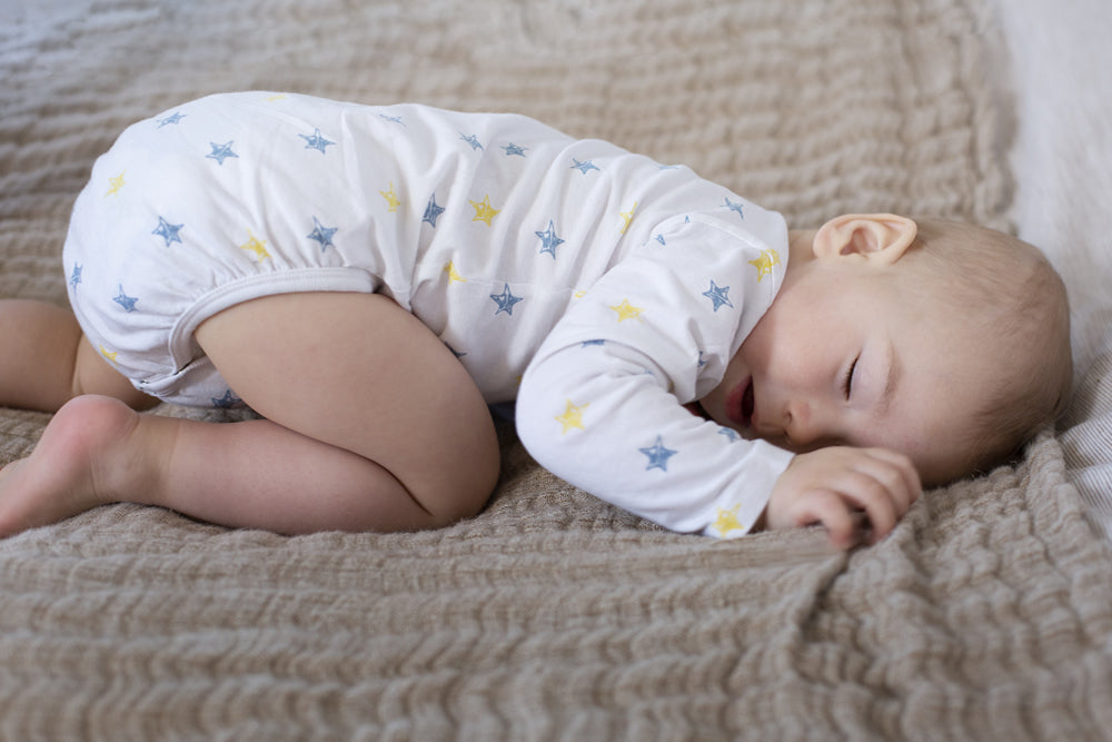 Truth about baby sleeping positions - is tummy sleeping safe?