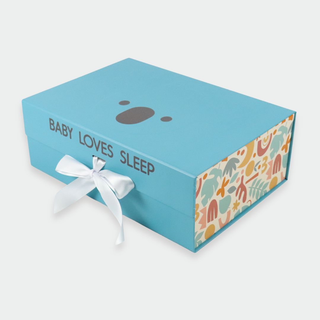 Beautiful memory keepsake box for treasured baby items with a secure magnetic flap and silky white ribbon designed by Baby Loves Sleep