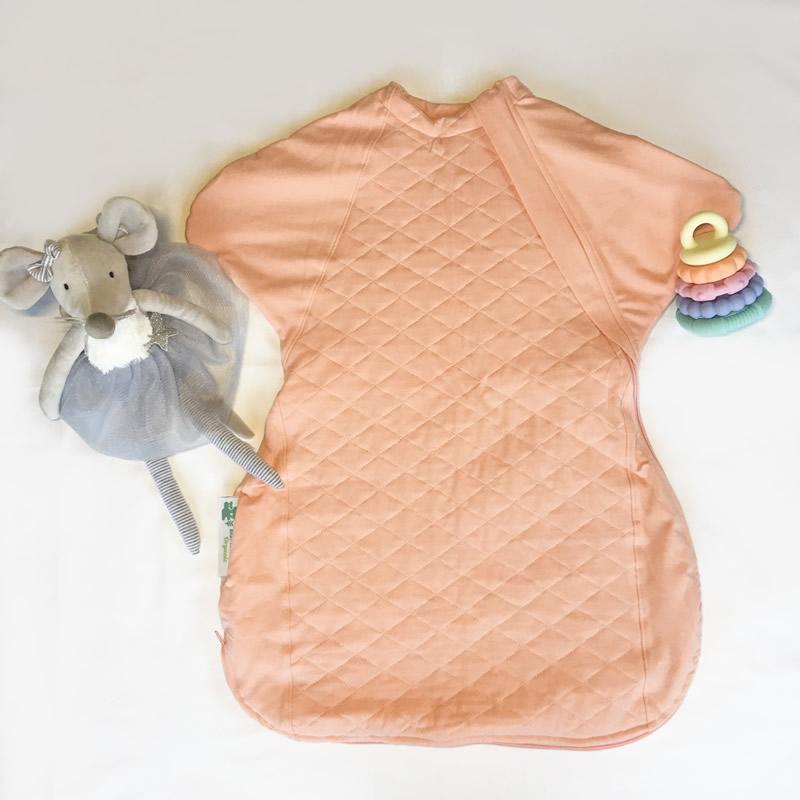 The Sleepy Hugs sleep sack for gentle swaddle transitioning, has a two way zipper top and bottom opening for easy diaper changes, the wide sack design is hip-friendly and fits a hip-dysplasia brace, helps startle reflex, perfect for tummy rollers.