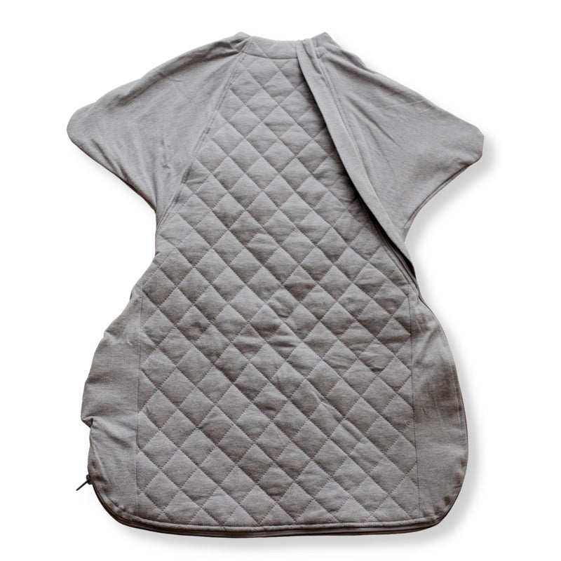 Sleepy Hugs helps your baby gently transition from swaddling to free arms.