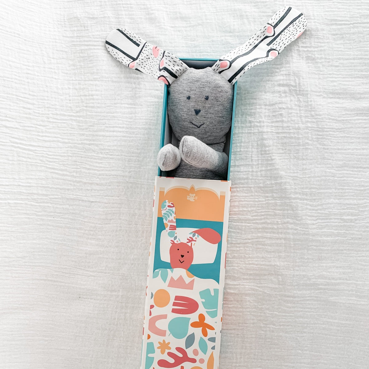 soft grey bunny doll with drawer bed