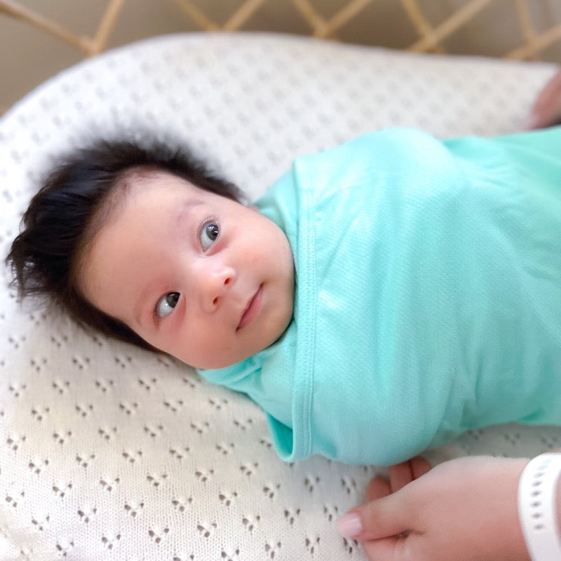 Koala Hugs newborn swaddle wrap helps calm startle reflex for sleeping baby