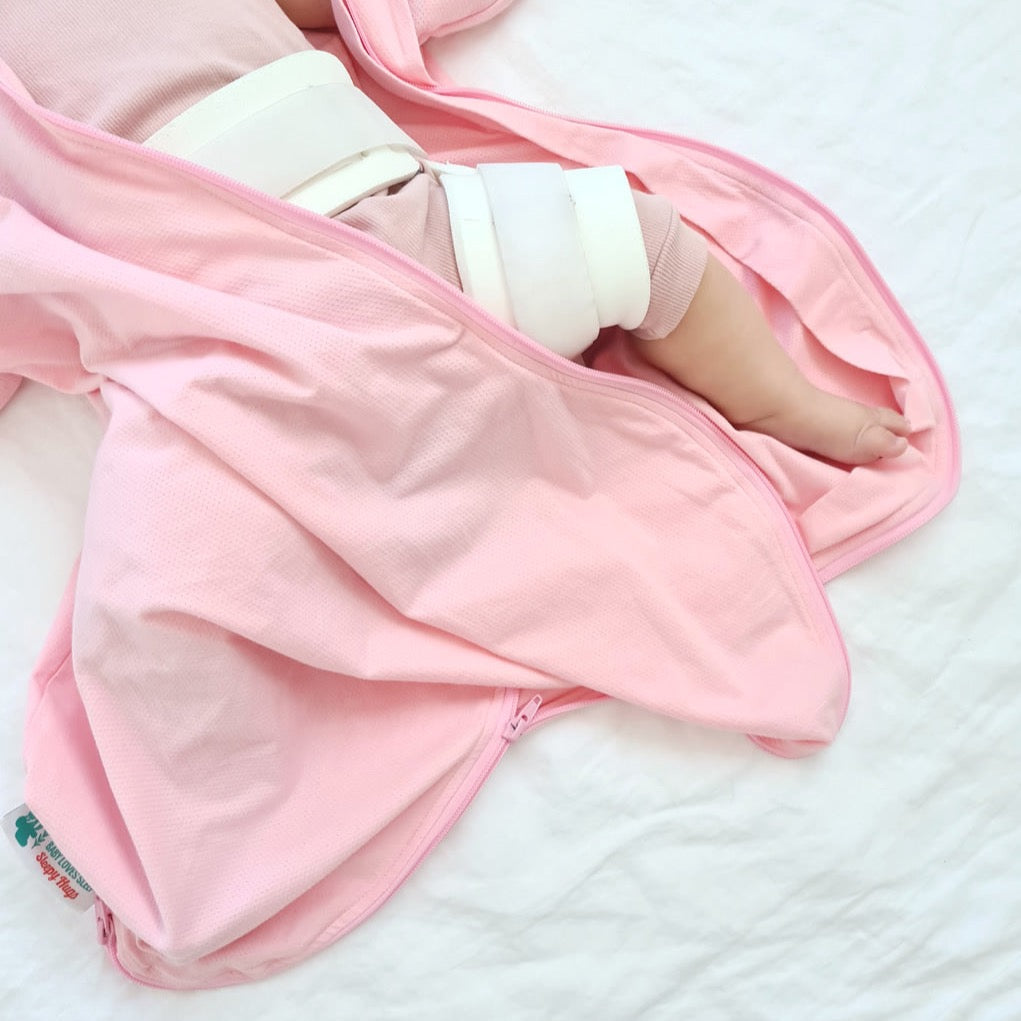 Baby sleep sack for babies needing to wear a hip harness, spica cast or rhino brace