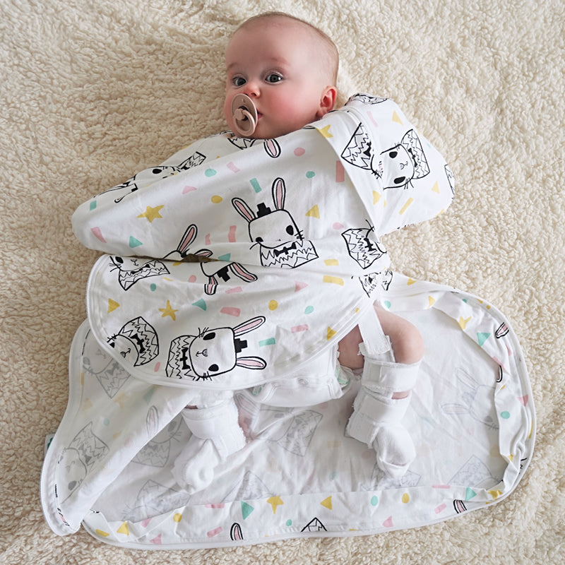 https://babylovessleepco.com/cdn/shop/products/Sleepy-Hugs-Hip-Harness-Some-Bunny-01-sq_1600x.jpg?v=1672640422